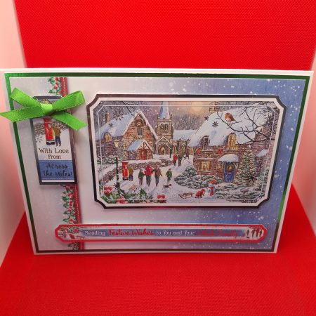 Handmade Christmas Card with Winter Village Scene and Green Ribbon Bow