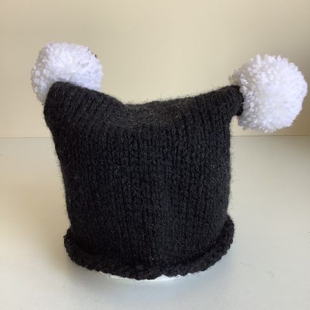 Black & white hand knitted spooky baby hat sizes from 0-18 months
