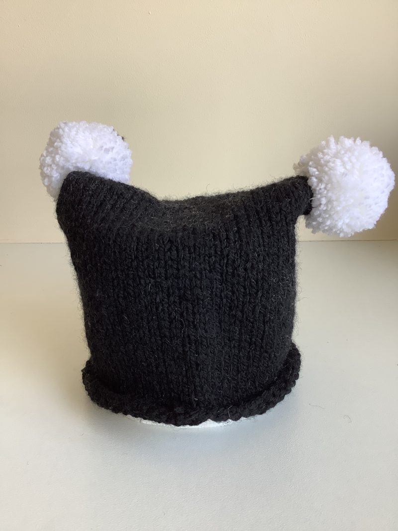 Black & white hand knitted spooky baby hat sizes from 0-18 months