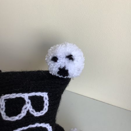 Black & white hand knitted spooky baby hat sizes from 0-18 months