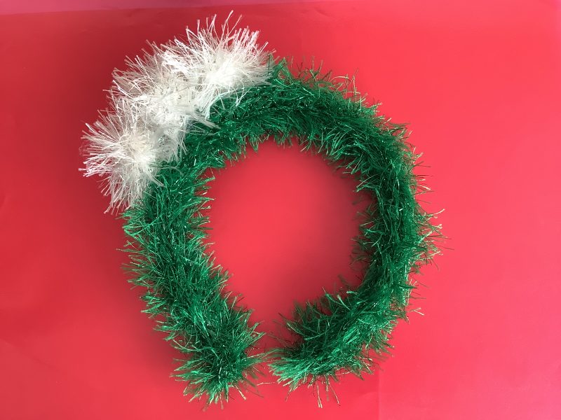 Sparkly, hand knitted green and white Pom Pom headband - 2 designs