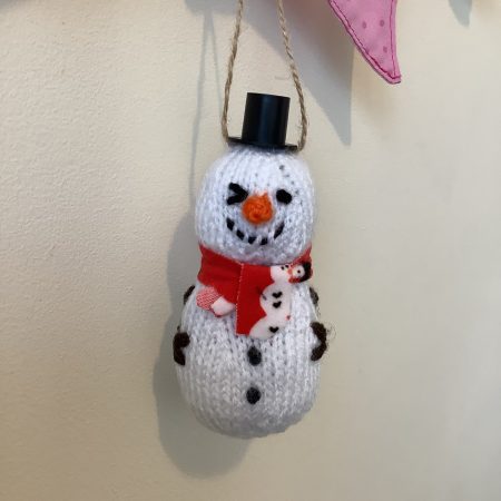 Hand knitted Christmas snowman/woman hanging decoration