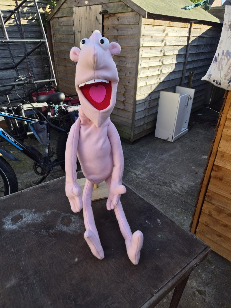 Naked pink puppet