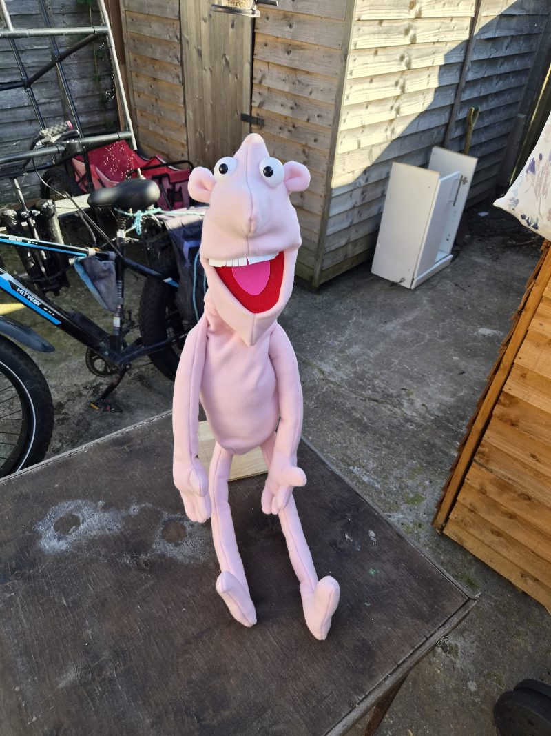 Naked pink puppet