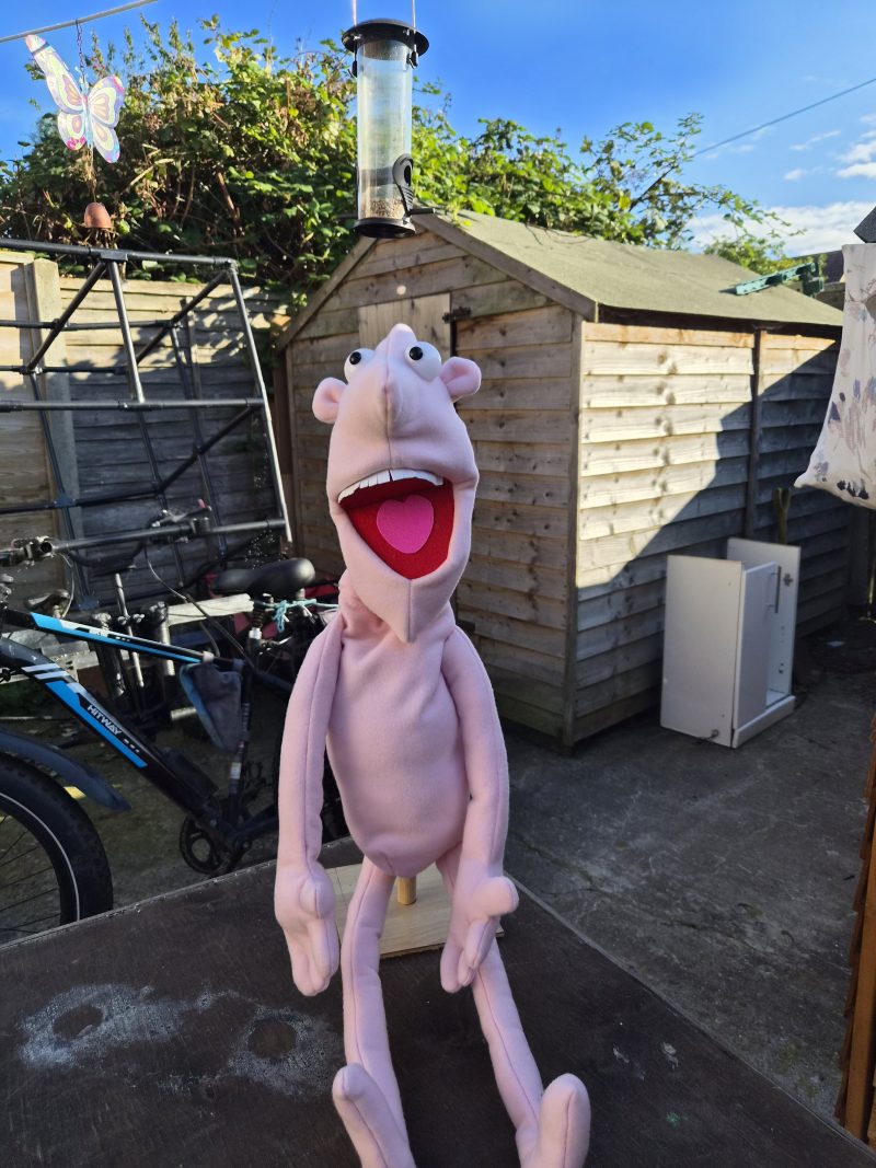 Naked pink puppet