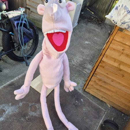 Naked pink puppet