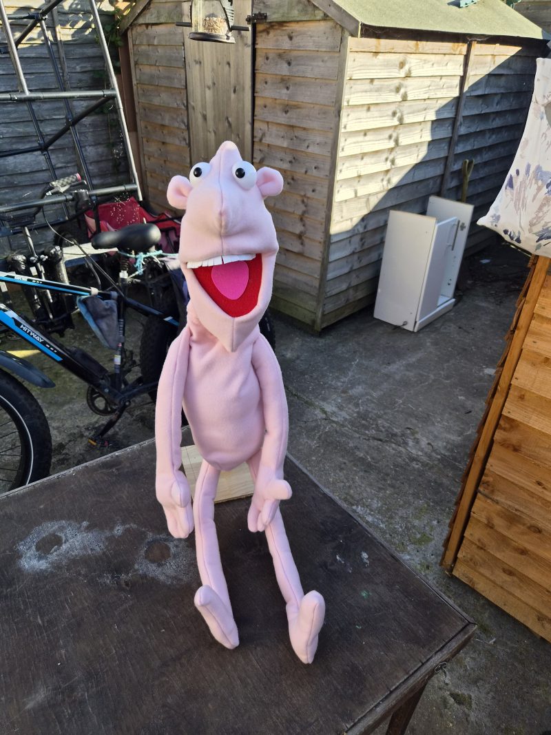 Naked pink puppet
