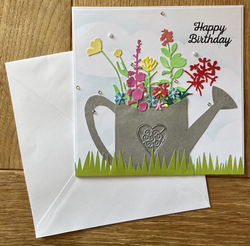Birthday card: flower filled watering can