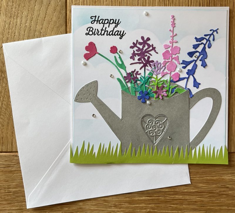 Birthday card: flower filled watering can
