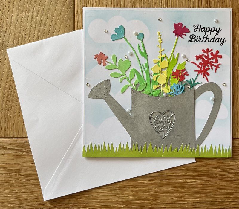 Birthday card: flower filled watering can