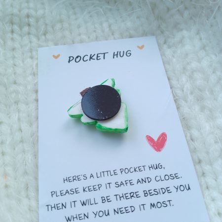 Handmade polymer clay festive pocket hugs