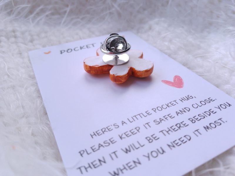 Handmade polymer clay festive pocket hugs