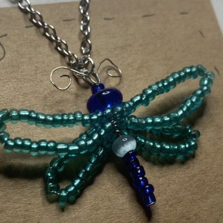 Handmade beaded wire-work dragonfly necklace on stainless steel chain