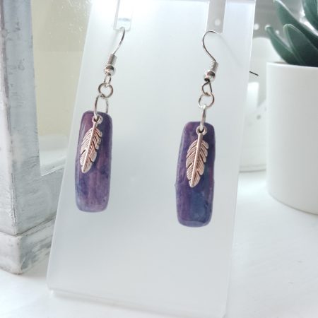 Handmade marble effect dangle drop earrings with silvery feather charm
