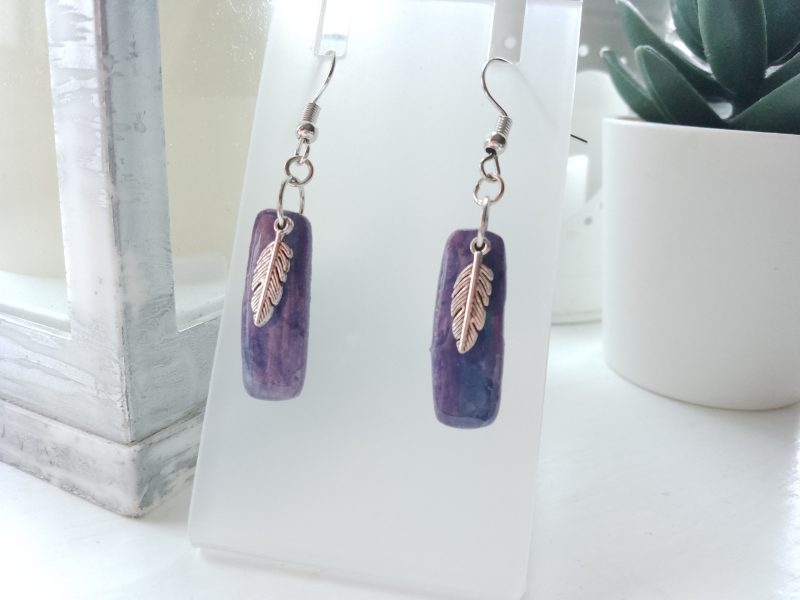 Handmade marble effect dangle drop earrings with silvery feather charm