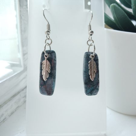 Handmade marble effect dangle drop earrings with silvery feather charm