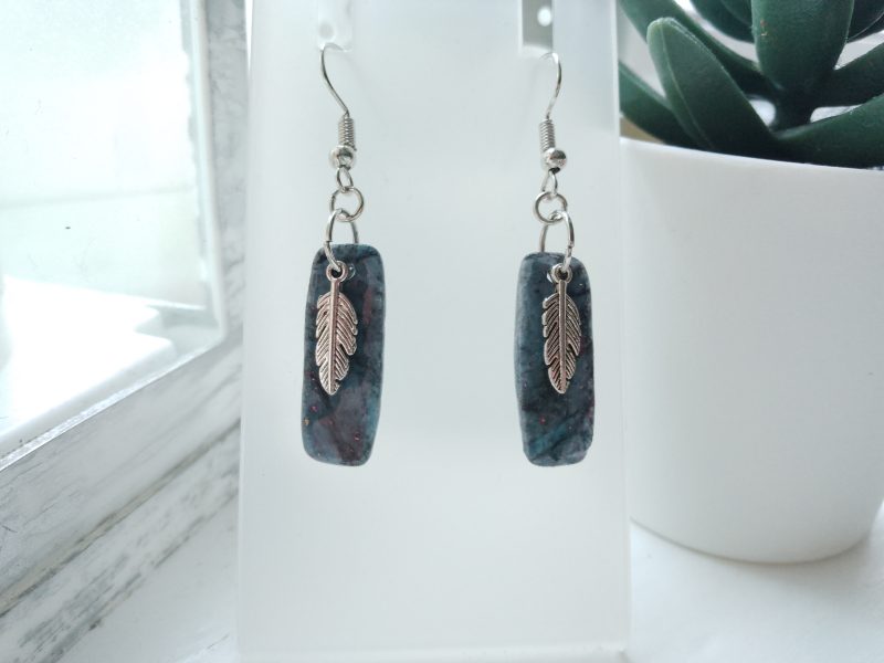 Handmade marble effect dangle drop earrings with silvery feather charm