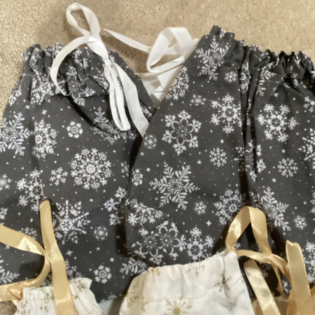 Handmade Selection of 7 Fabric gift bags 2 x Grey with White Snowflakes 5 x Small Gorgeous Gold Star Patterned Fabric