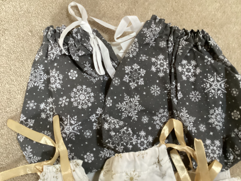 Handmade Selection of 7 Fabric gift bags 2 x Grey with White Snowflakes 5 x Small Gorgeous Gold Star Patterned Fabric