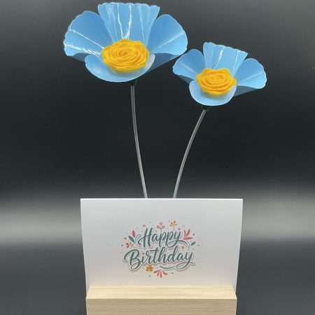 Hand crafted blue and yellow metal flowers with birthday card and stand