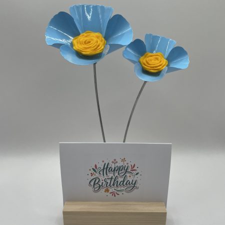 Hand crafted blue and yellow metal flowers with birthday card and stand