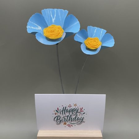 Hand crafted blue and yellow metal flowers with birthday card and stand