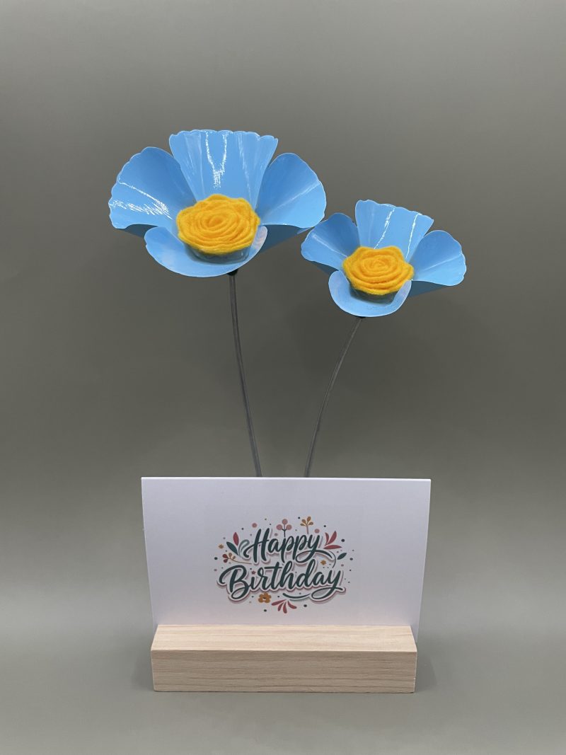 Hand crafted blue and yellow metal flowers with birthday card and stand