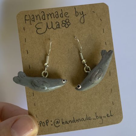 Hand-sculpted and painted clay seal earrings with silver tone stainless steel hooks
