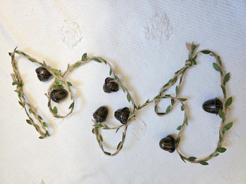 Garland of Seven Bronze Acorn Bells on Leafy Jute Twine