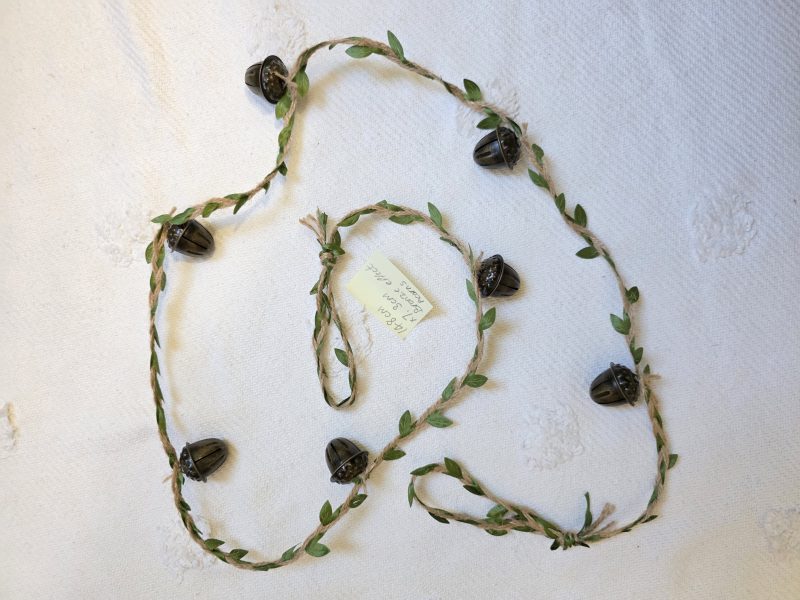 Garland of Seven Bronze Acorn Bells on Leafy Jute Twine