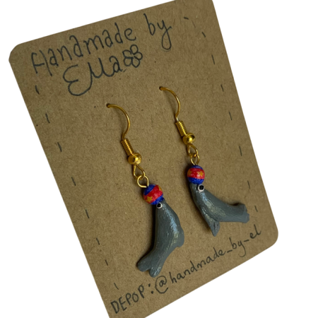 Hand-sculpted and painted sea lion earrings with gold tone stainless steel hooks