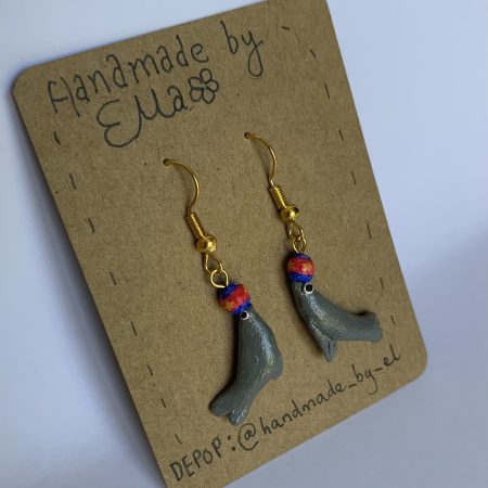 Hand-sculpted and painted sea lion earrings with gold tone stainless steel hooks