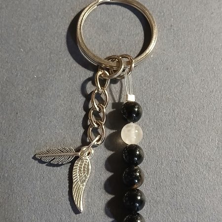 Beaded keyring with wings and with natural crystals.