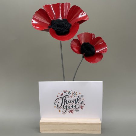 Hand crafted red and black flowers with birthday card and stand