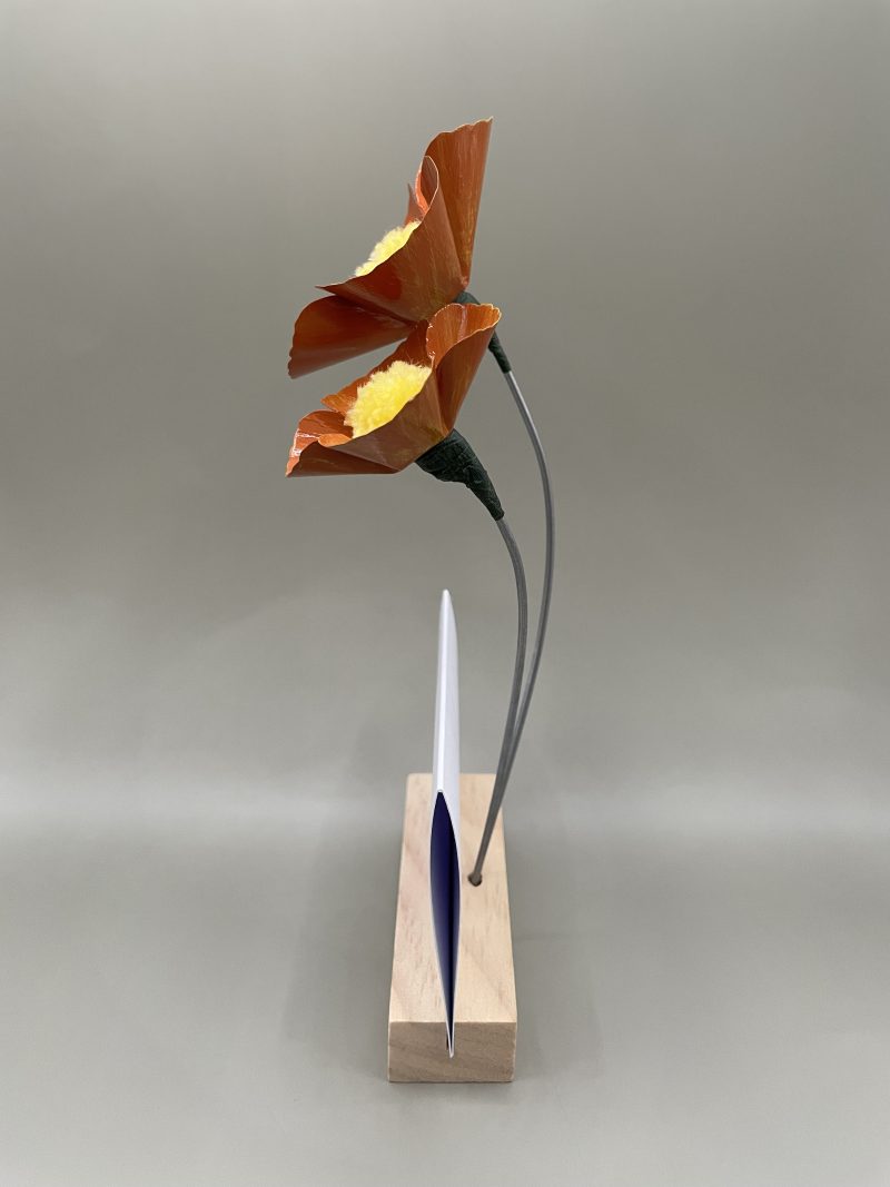 Hand crafted orange and yellow metal flowers with birthday card and stand