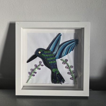 Blue hummingbird with flowers