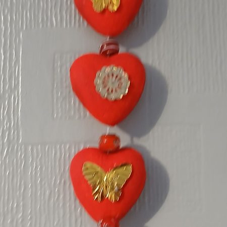 3 Hearts with golden/green sequins and colourful tassel