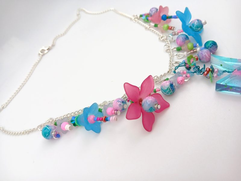 Hummingbird statement necklace pink and blue hues