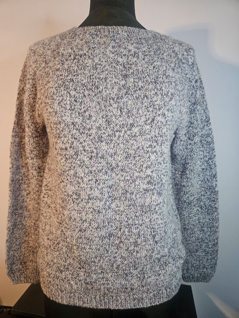 Handknitted 100% wool jumper.