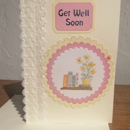 "Get Well Soon" handmade card with decorative ribbon and a watercolour centre