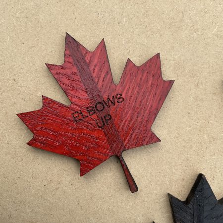 Canadian maple leaf badge, oak and mahogany, elbows up
