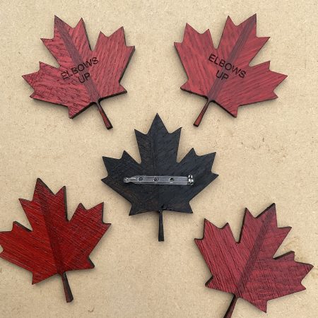 Canadian maple leaf badge, oak and mahogany, elbows up