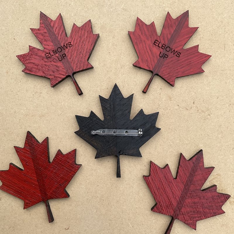 Canadian maple leaf badge, oak and mahogany, elbows up