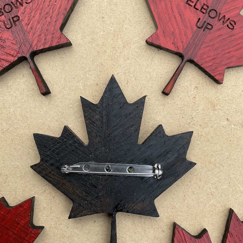 Canadian maple leaf badge, oak and mahogany, elbows up