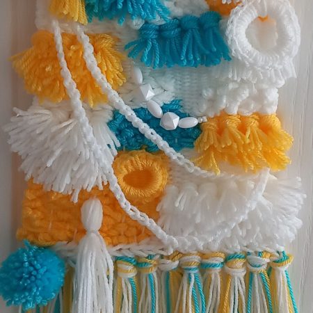 Woven wall hanging, handmade.