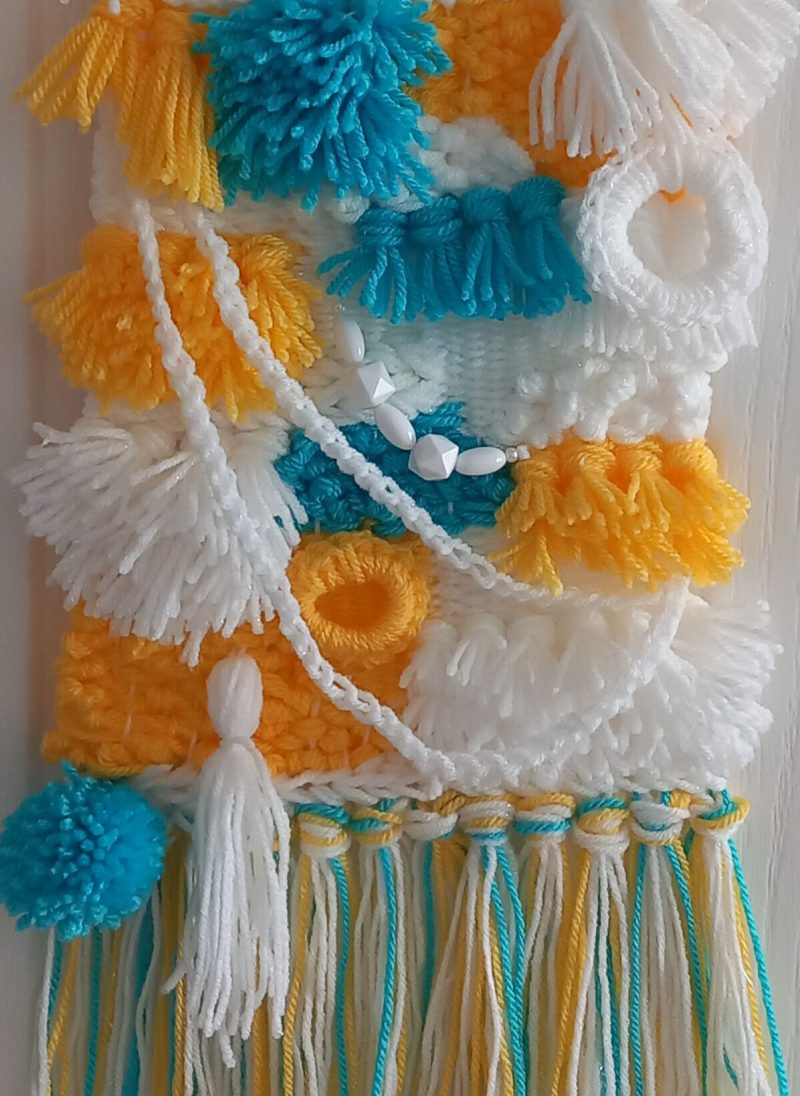 Woven wall hanging, handmade.