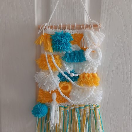 Woven wall hanging, handmade.