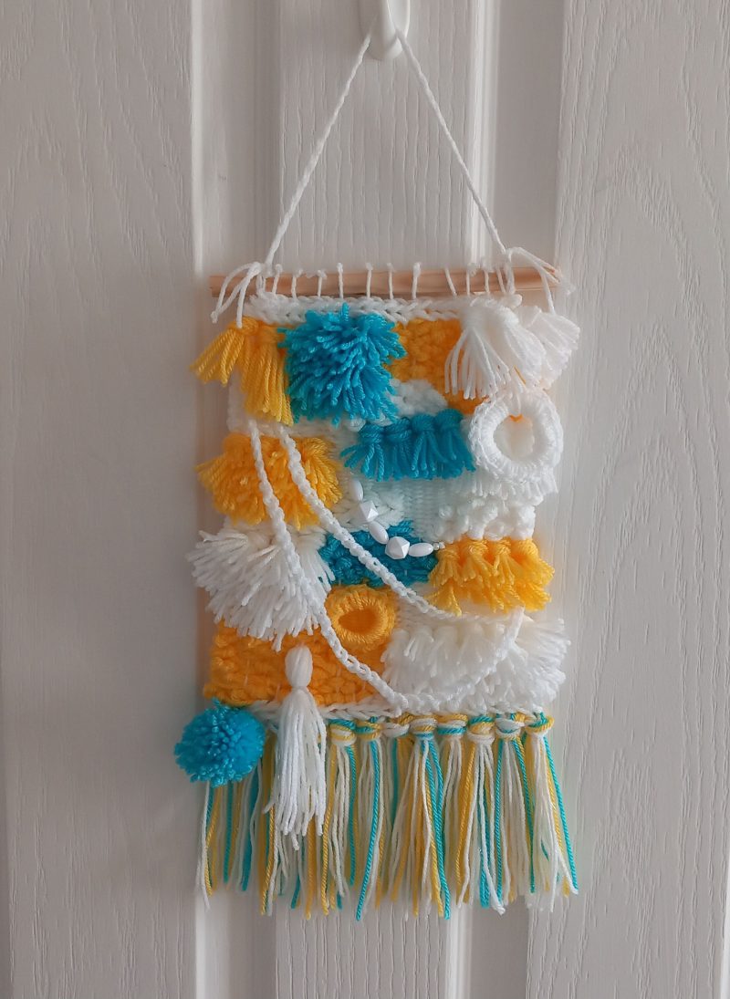 Woven wall hanging, handmade.