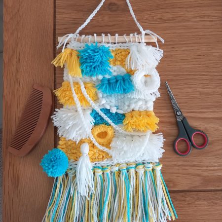 Woven wall hanging, handmade.