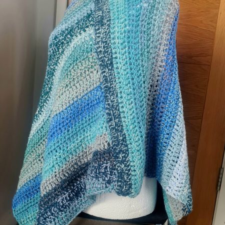 Blue crochet poncho
